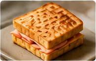 Ham and cheese toastie on a plate
